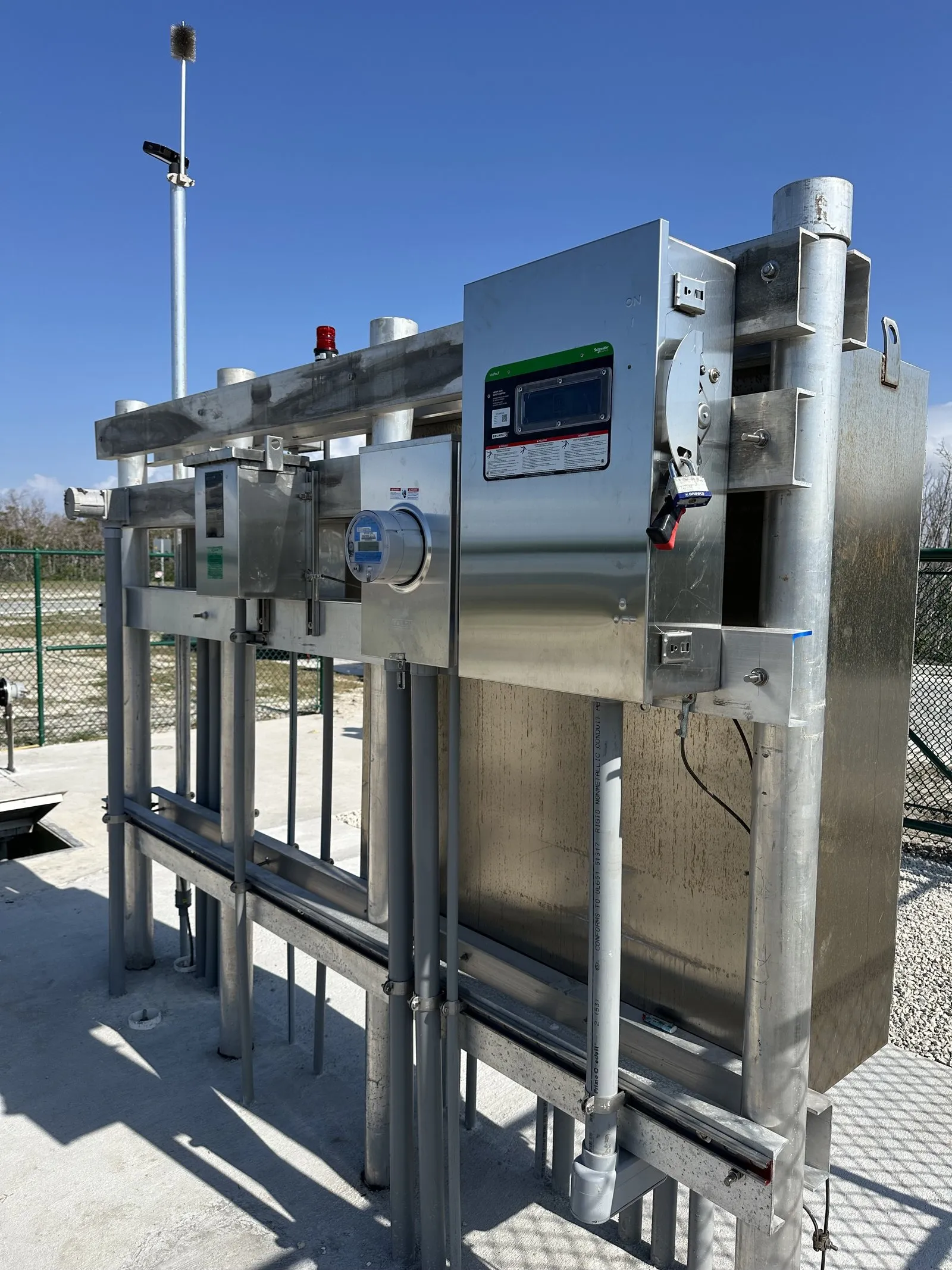 Aluminum service rack with metering and a locked disconnect switch at an outdoor lift station